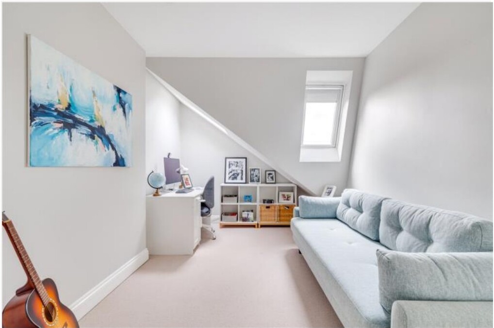 Home office and lounge with desk and sofa